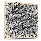 Abstract splatter design on acrylic glass artwork, showcasing vibrant colors and dynamic patterns, displayed with metal pins for mounting. Perfect for modern decor.