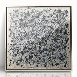 Framed acrylic artwork showcasing vibrant abstract splatters in silver and bold colors, adding a modern touch to home decor. Ideal for contemporary art enthusiasts.