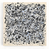 Abstract canvas art featuring vibrant splatters in shades of blue, yellow, and red, ideal for modern decor, enhancing living spaces with bold color and texture.