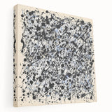 Abstract splatter canvas art in vibrant colors, showcasing a dynamic design with bold patterns, ideal for modern interior decor or artistic spaces.