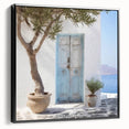 Black and white framed canvas of a vintage Greek door design, ideal for bedroom wall placement.