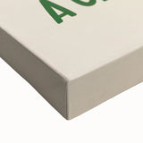 Close-up of a large art canvas featuring a black and white photograph of assorted pastries, ideal for bedroom wall decor.