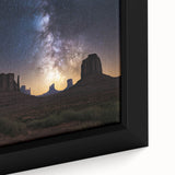 Close-up of a framed desert landscape canvas print showcasing vibrant sunset colors and intricate details, ideal for enhancing home decor with a natural theme.