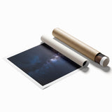 Desert landscape rolled print showcasing vibrant hues of orange and yellow, depicting a serene sunset over sand dunes, ideal for home decor or office framing.