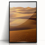 Framed acrylic wall art showcasing a stunning desert dune landscape in black frame, perfect for modern home decor, adding warmth and elegance to any space.