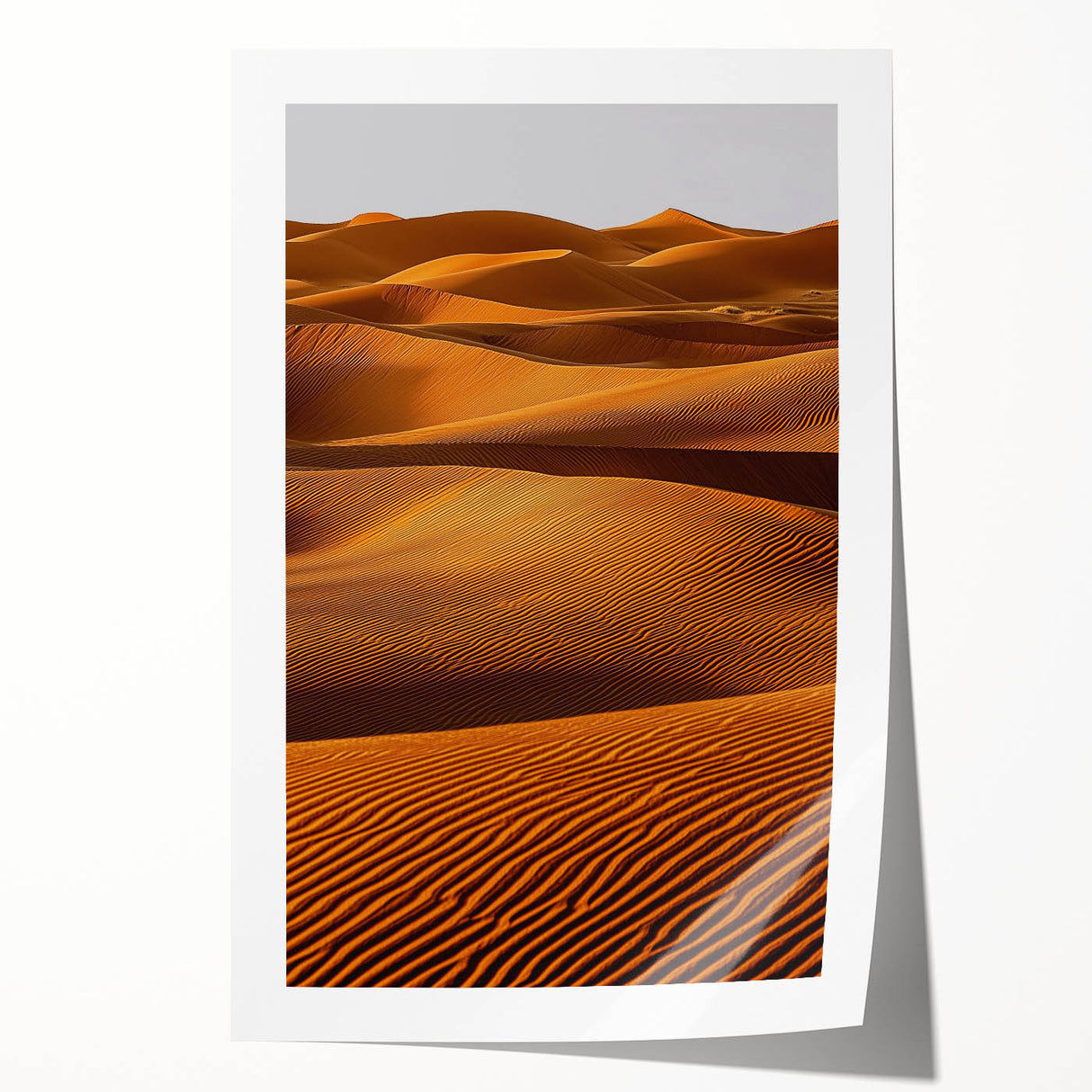Soft, undulating dunes captured in a stunning landscape print, showcasing delicate shades of beige and gold, rolled for easy shipping and display. Perfect for home decor.