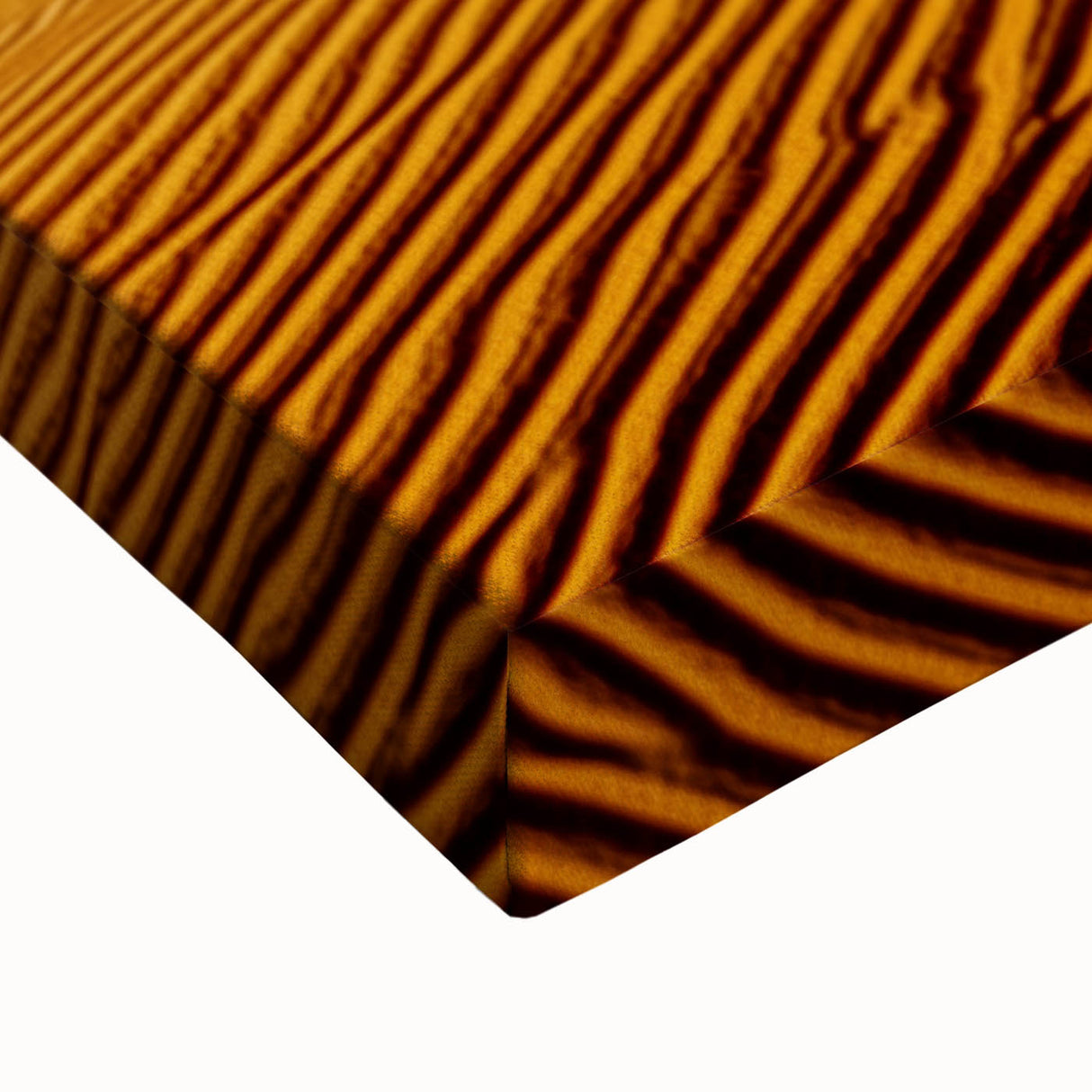 Close-up of a stretched canvas depicting serene desert dunes at sunset, showcasing soft beige and warm orange hues, perfect for enhancing modern home decor.