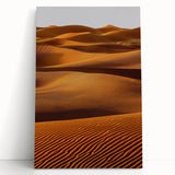 Stretched canvas artwork depicting serene sand dunes under a pastel sky, perfect for modern home decor. Ideal for living rooms or offices, adding a calming touch.