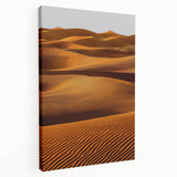Stretched canvas artwork showcasing a serene desert landscape with dunes under a clear blue sky, ideal for modern home decor and art enthusiasts.
