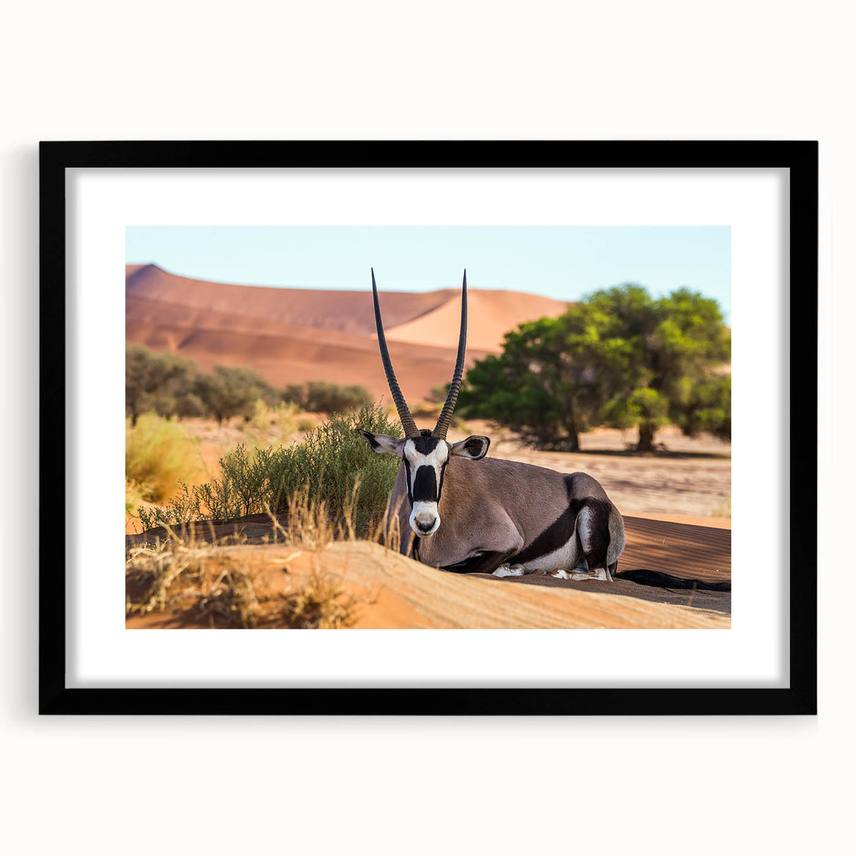 Extra large abstract art print depicting textured, colorful African scenery on a black framed canvas.