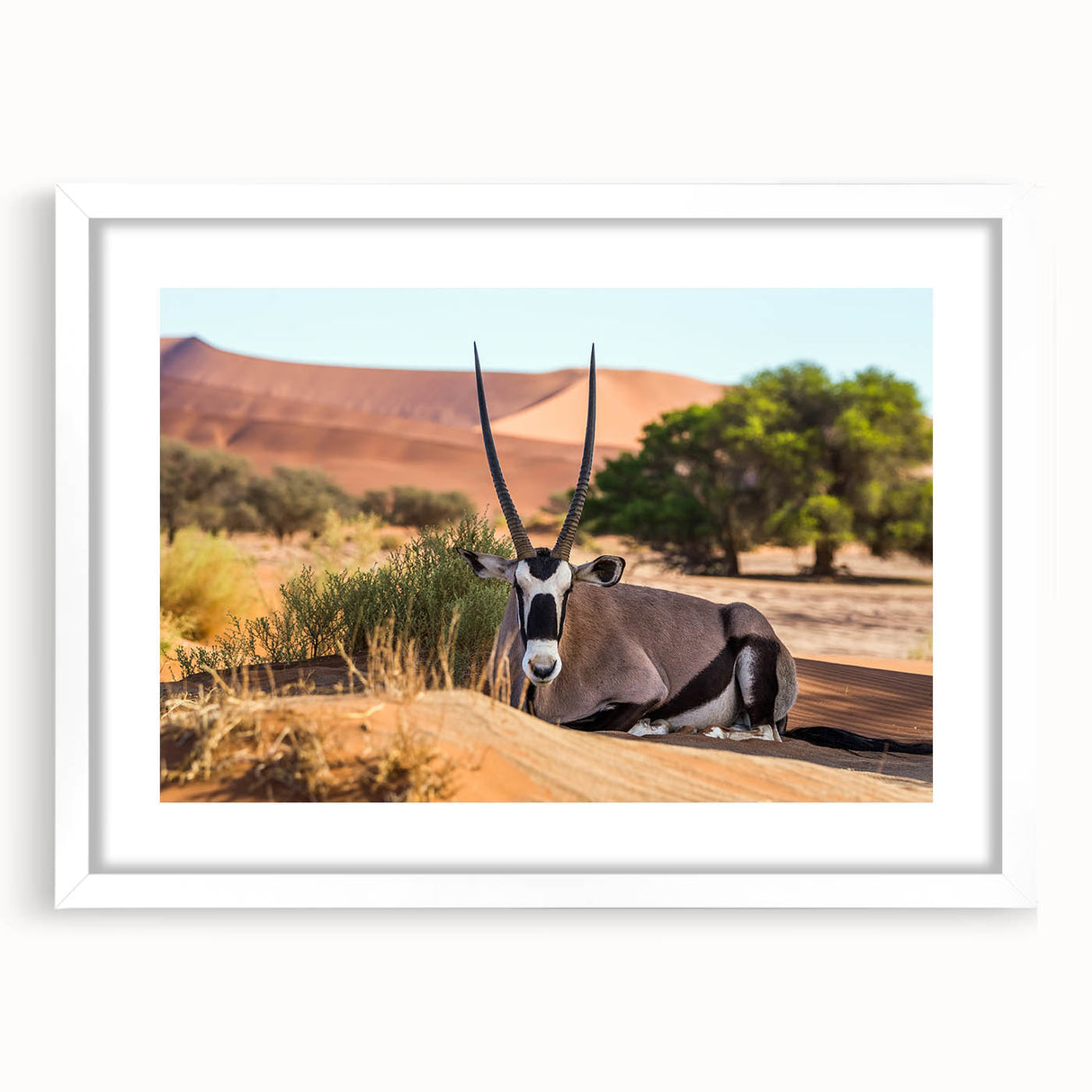 Extra large abstract art print depicting textured African scenery in muted earth tones, framed with a white mat.