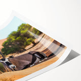 Extra large wall art featuring a line art design of flowers, in muted colors on a rolled canvas.