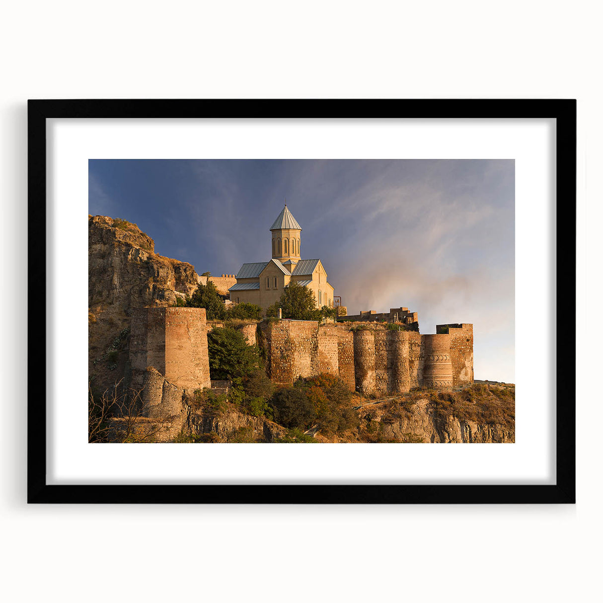 Abstract art print with vibrant, colorful textures on a large canvas, framed in black, ideal for living room decor.