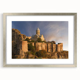 Textured abstract art print depicting a serene Georgian landscape in muted earth tones, framed in silver.