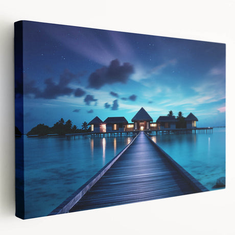 Side view of a stretched canvas featuring a serene Maldives beach scene in soft blue and white tones.