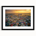 Extra large abstract art print featuring a vibrant, textured depiction of a Caribbean scenery, framed with a black mat.