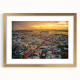 Abstract art print of a Caribbean seascape in vibrant blue and green hues on a framed canvas, suitable for dining room decor.