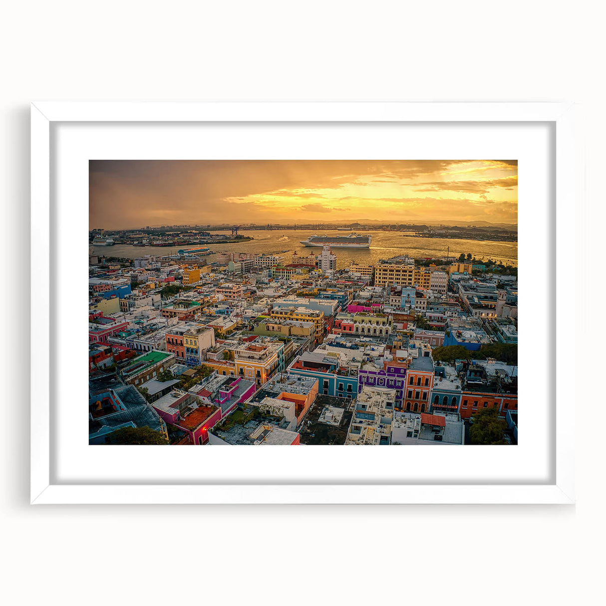 Textured abstract art print depicting a Caribbean scenery in vibrant blue and green tones, framed with a white mat.