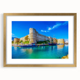 Abstract art print of a European Cyprus landscape in muted earth tones, framed in gold, suitable for dining room decor.