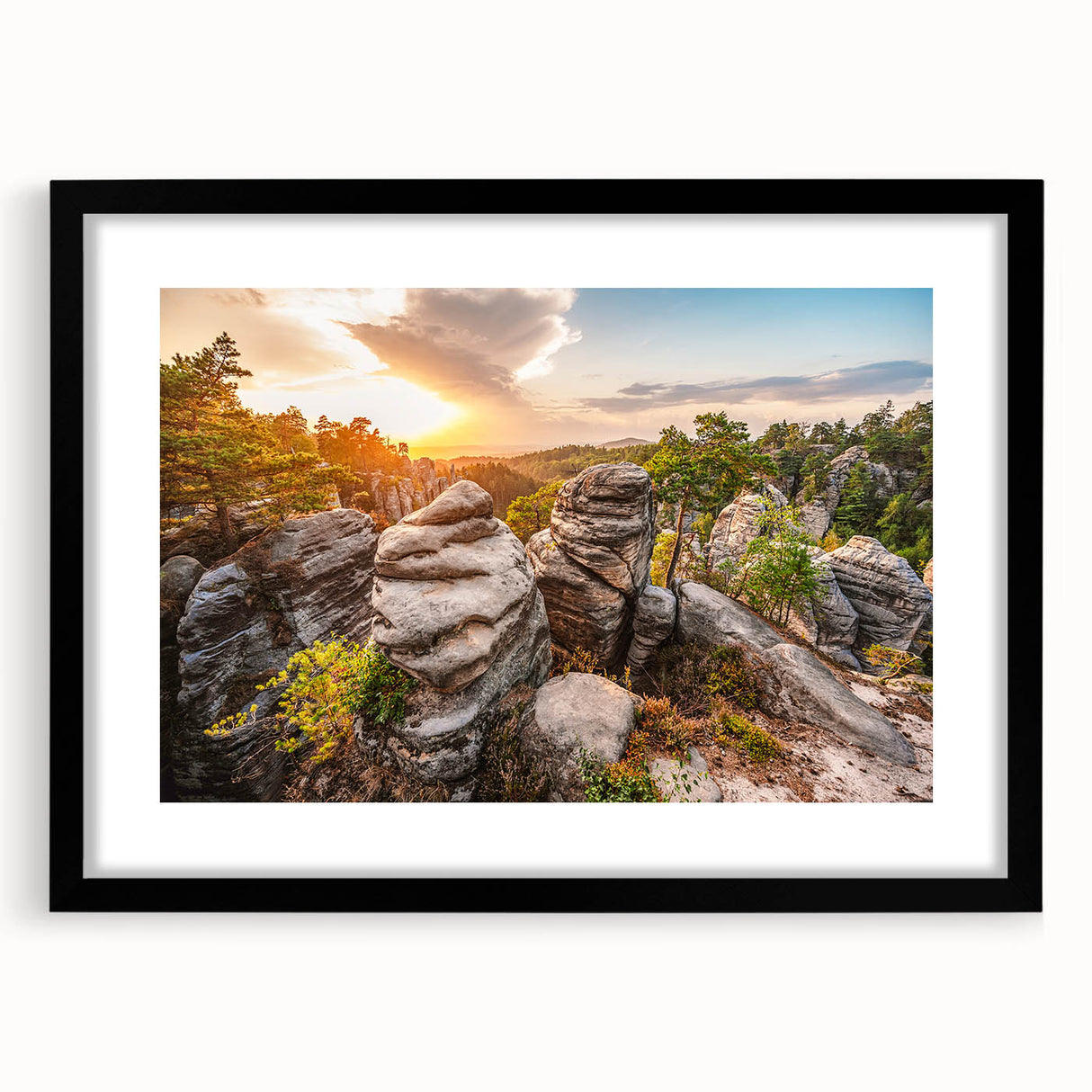 Textured art depicting an abstract European cityscape in muted earth tones on a framed black mat.