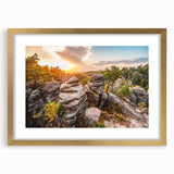 Abstract art print of a European cityscape in muted gold and blue tones on a framed canvas, suitable for dining room decor.