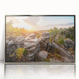 Large art print of a mid-century modernist European scenery in muted colors, framed in silver acrylic.