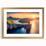 Abstract art print of a European landscape in muted green and blue tones on a gold-framed canvas.