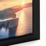 Close-up of a black framed canvas featuring a textured, colorful European scenery.