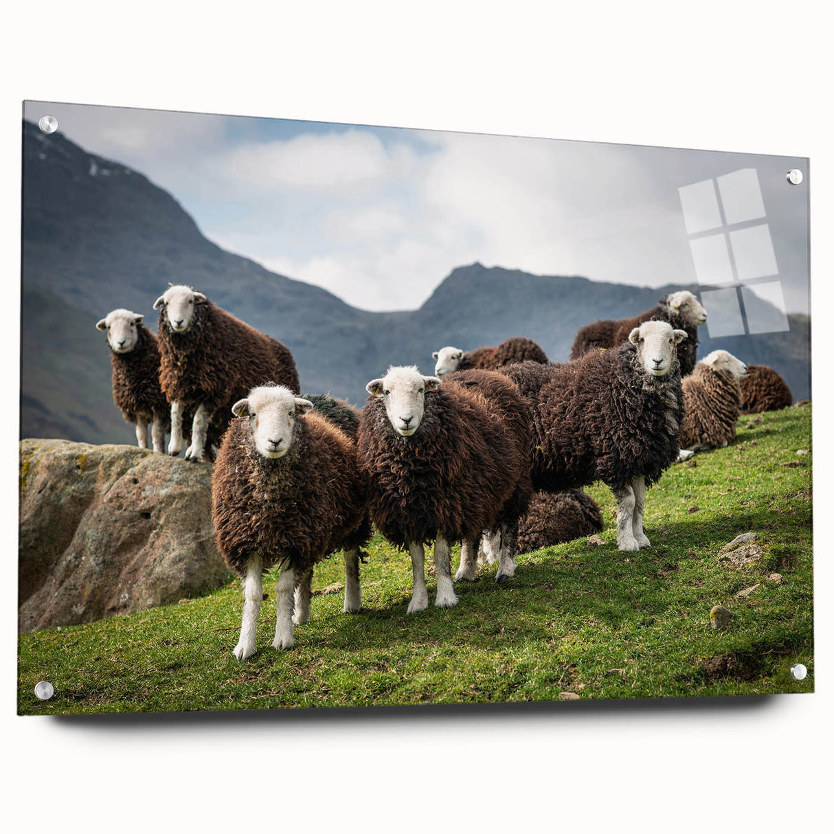 Acrylic print of Cumbria's landscape featuring muted green and blue tones, suitable for bedroom or dining room decor.