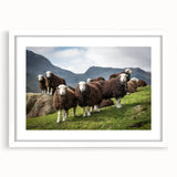 Textured abstract art print of Cumbria landscape in muted earth tones, framed with a white mat, ideal for bedroom wall decor.