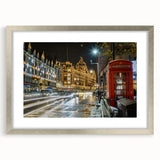 Textured abstract art print depicting the London skyline in muted gray and blue tones, framed in silver.