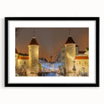 Extra large abstract art print of a colorful European scenery on textured canvas, framed in black.