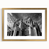 Abstract art print of Paris scenery in muted gold and blue tones, framed with mat, suitable for bedroom or dining room decor.