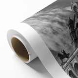 Art Deco poster of Paris scenery on rolled canvas, featuring muted blue and beige tones.