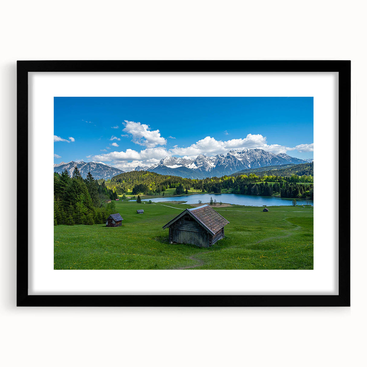 Extra large abstract art print of a colorful Bavarian landscape, textured on a black framed canvas.