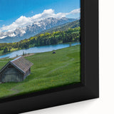Extra large framed canvas of a Bavarian landscape in black with colorful, textured elements, ideal for living room decor.