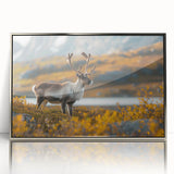 Large art print of a Greenlandic landscape in muted green and blue tones on a silver-framed acrylic.