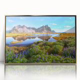 Acrylic print of a serene Icelandic landscape in muted blue and green tones, framed in gold.