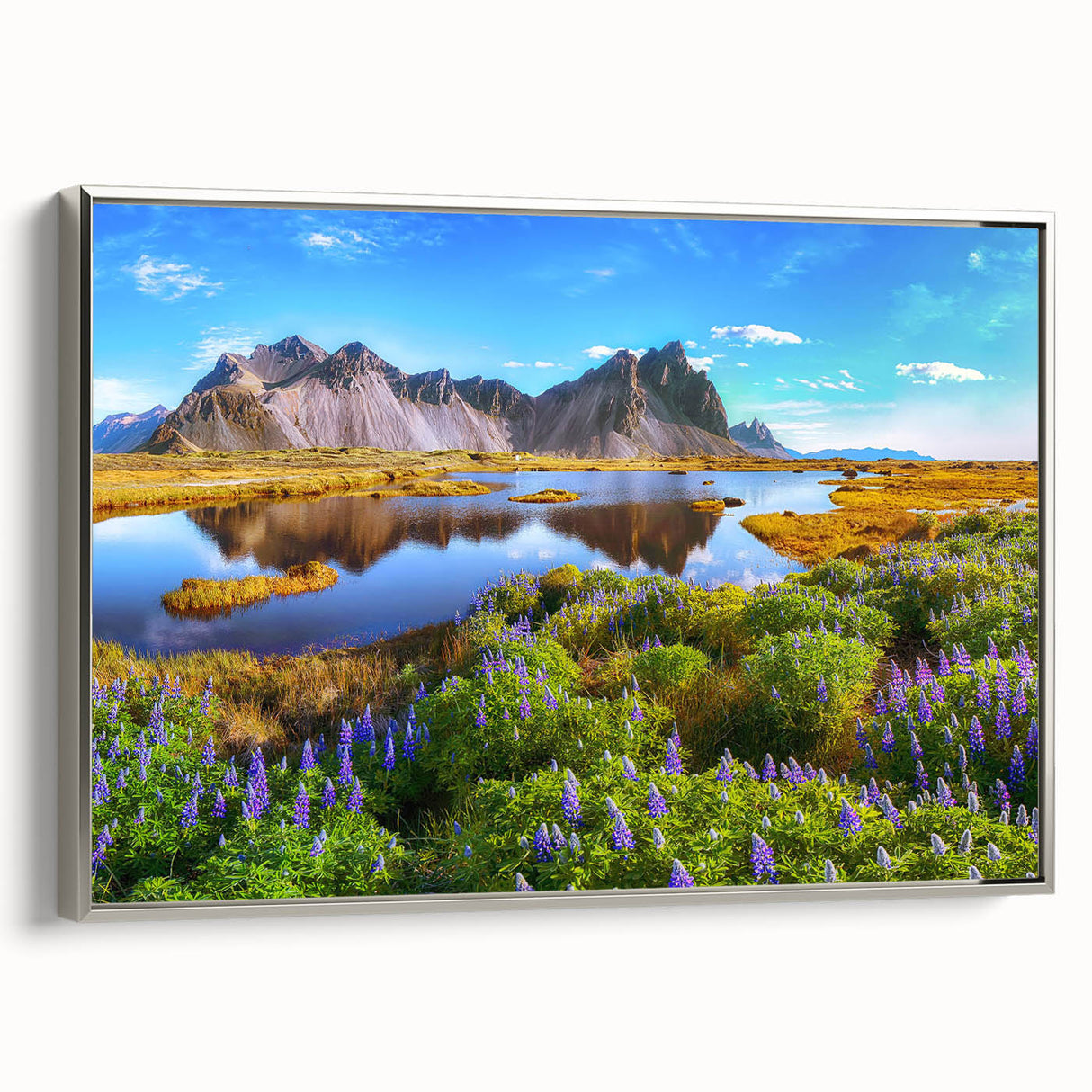 Framed canvas depicting a vintage Icelandic landscape in muted black and colorful hues, ideal for living room decor.