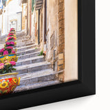 Black wall art depicting a textured Sicilian landscape in vibrant colors on a framed canvas.
