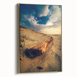 Framed canvas wall art featuring a vintage-style landscape painting of a Lithuanian scenery in muted gold and black tones.