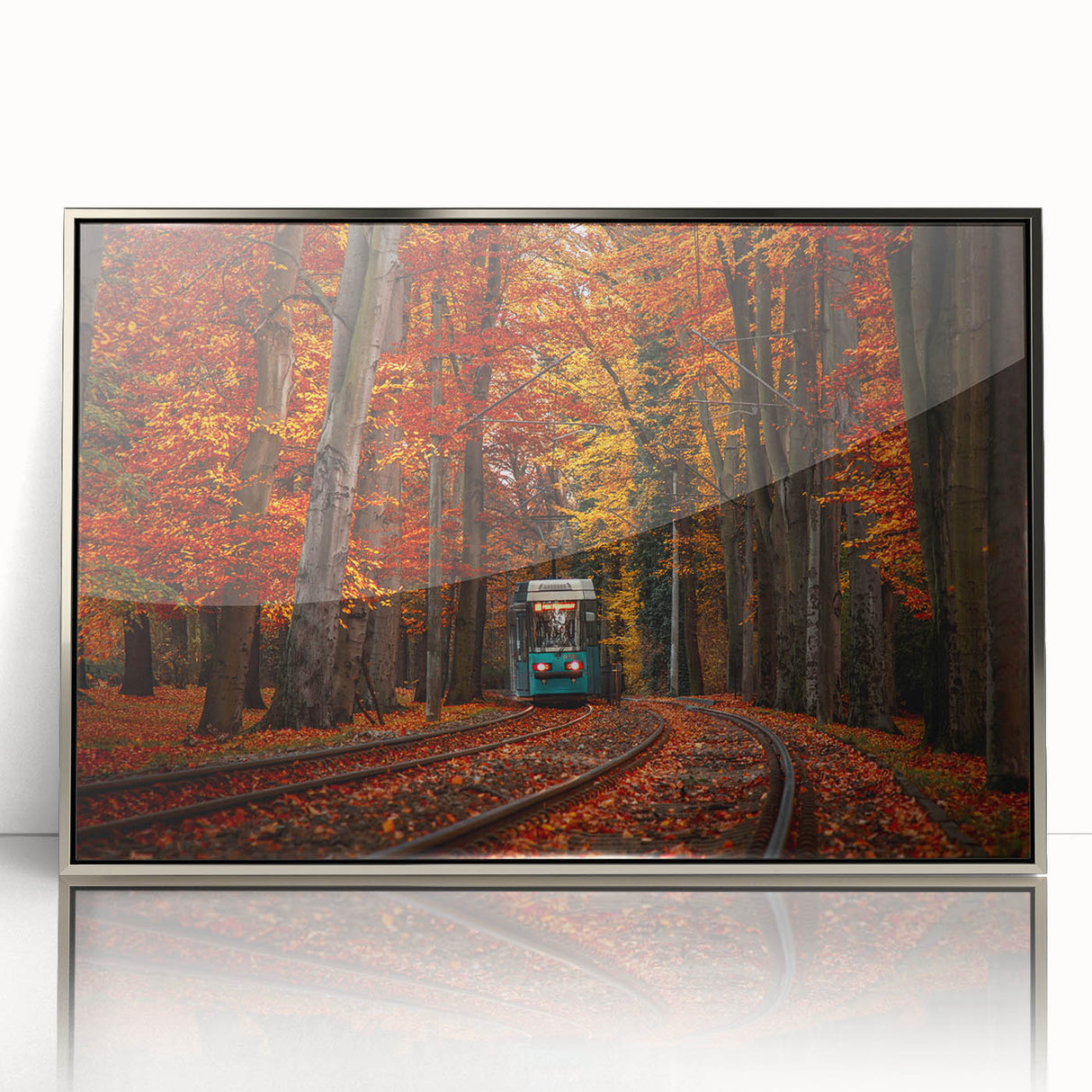 Large art print of a European cityscape in muted gray and blue tones on a silver-framed acrylic.