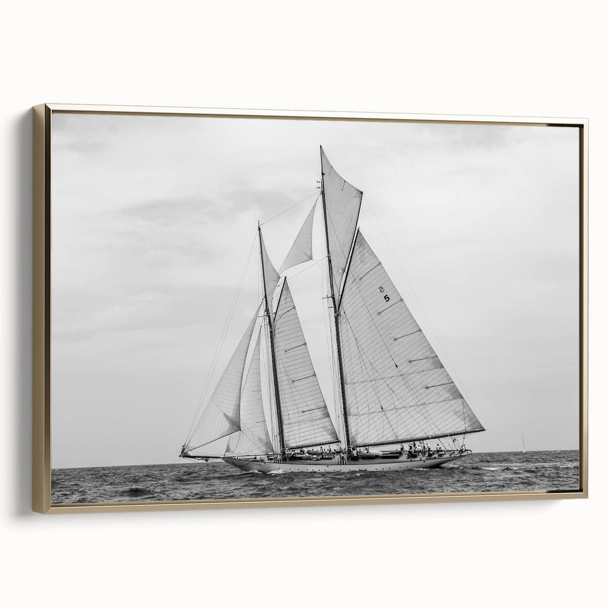 Framed canvas of a vintage-style Barcelona landscape in black and gold tones, ideal for bedroom wall art.
