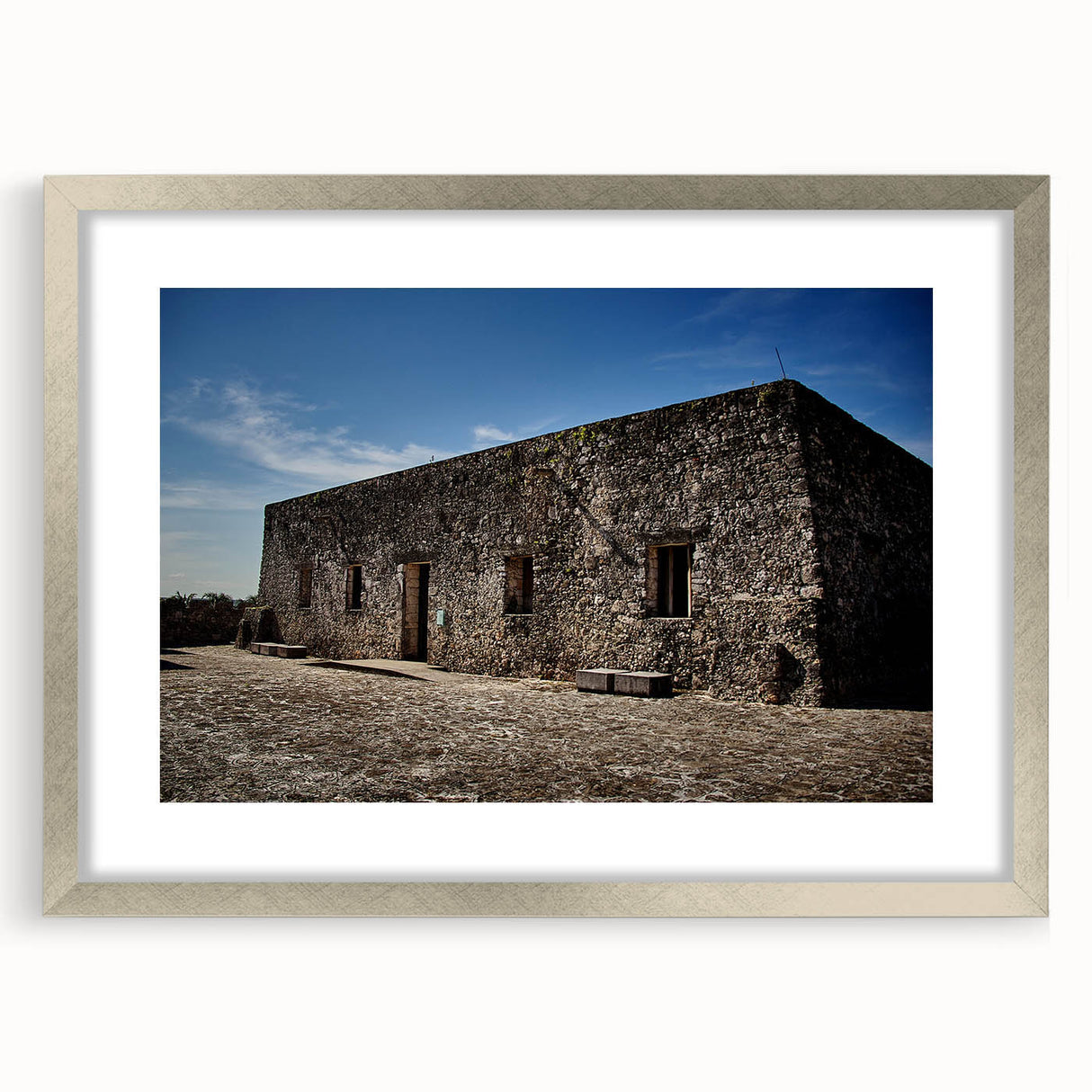 Textured abstract art print of Quintana Roo scenery in muted earth tones on a framed canvas, ideal for bedroom art.
