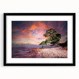 Abstract art print of Auckland skyline in vibrant colors on a large textured canvas, framed in black.