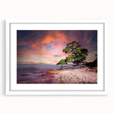 Abstract art print of Auckland skyline in muted blue and gray tones on a white framed canvas.