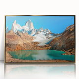 Mid-century modernist acrylic print of an Argentine landscape in muted earth tones, framed in gold.