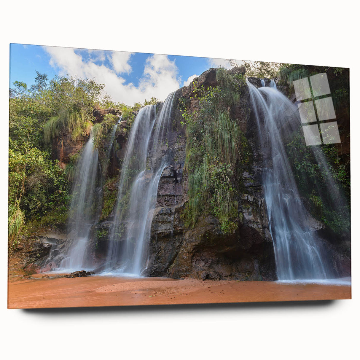 Large abstract wall art of a Bolivian landscape in vibrant blues and greens on acrylic glass.