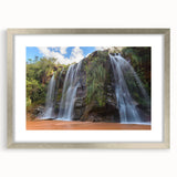 Textured abstract art print depicting a Bolivian landscape in muted earth tones on a silver-framed mat.