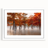 Abstract art print depicting a Louisiana landscape in muted green and blue tones, framed with a white mat.
